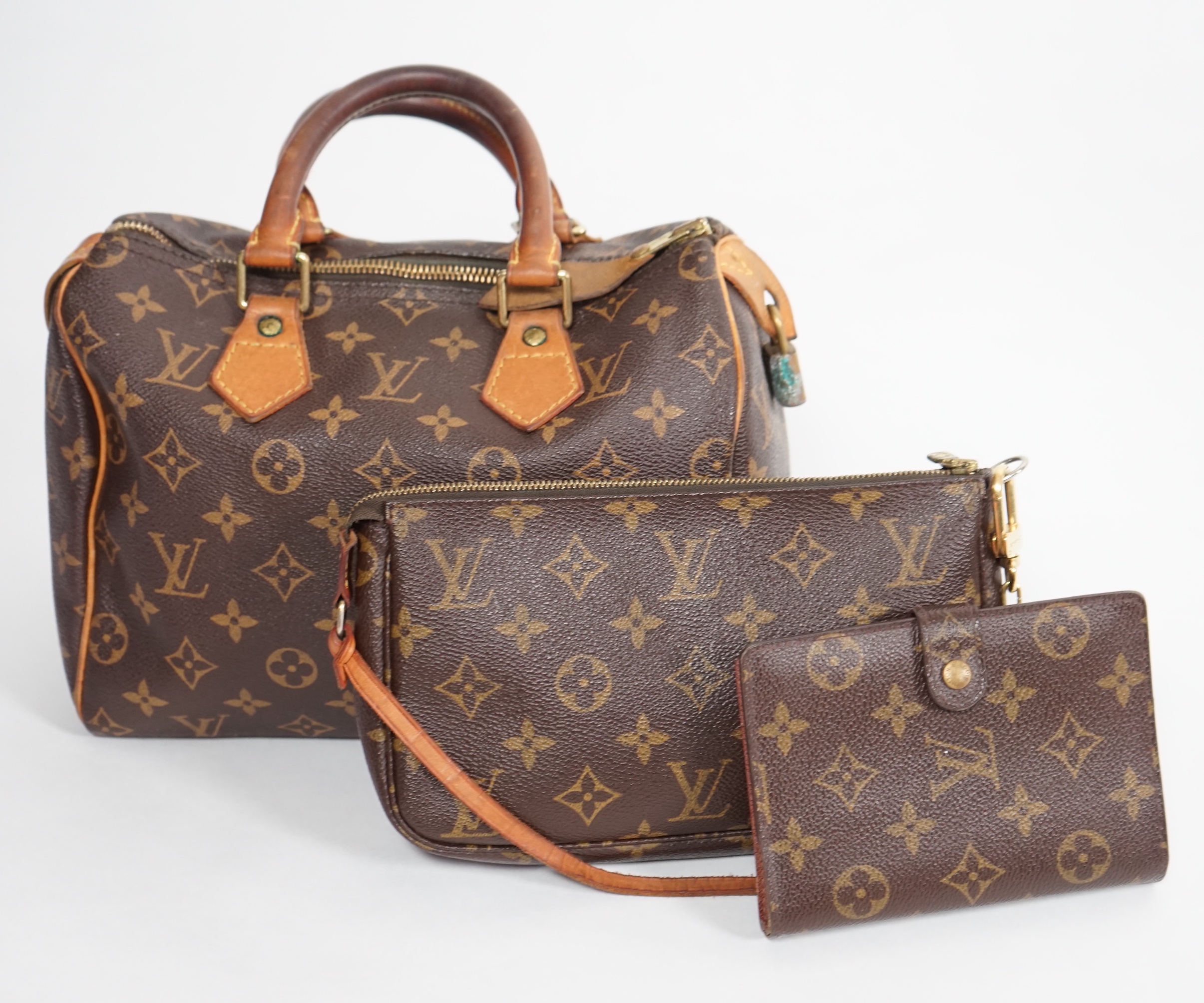 A vintage Louis Vuitton Monogram canvas Speedy 25 handbag, a Louis Vuitton Pochette Accessories Canvas bag and small Agenda PM Speedy bag: width 25cm, height overall 29cmm depth15cm, Pochette Bag: width 22cm, height 13cm